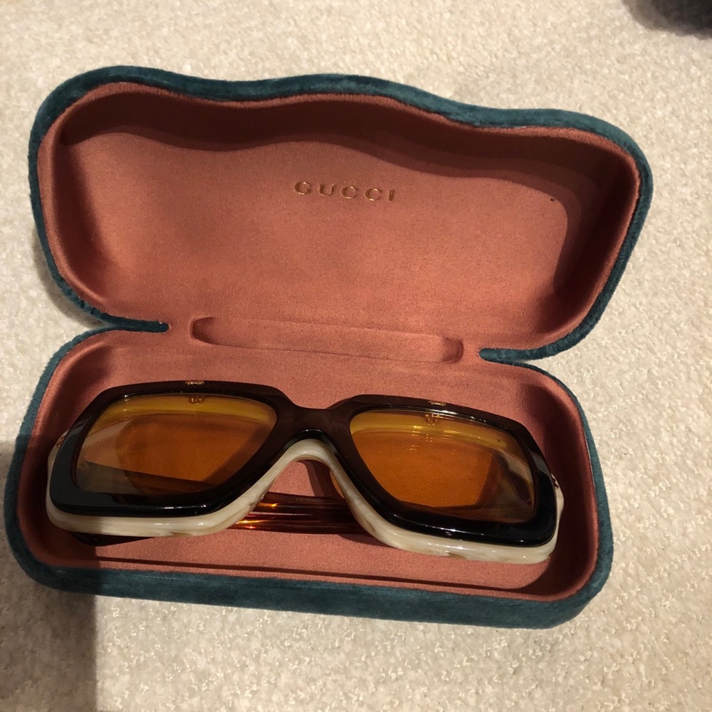 Gucci sunglasses.